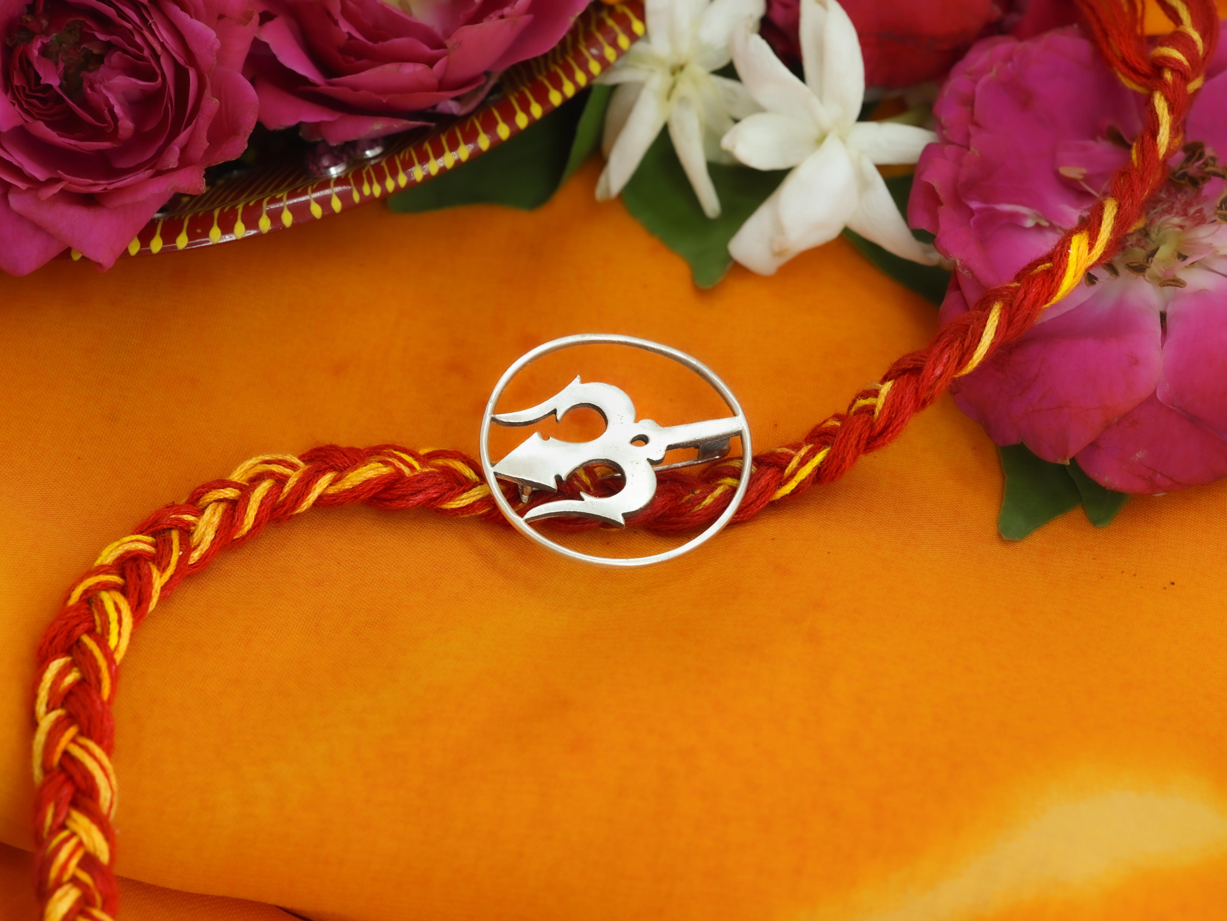 Trishul Brooch Rakhi